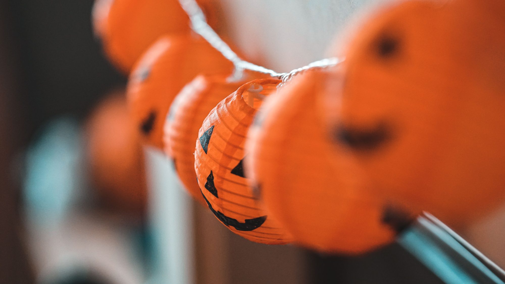 Close-up of decorative orange Halloween pumpkin lanterns. Perfect for festive atmosphere.