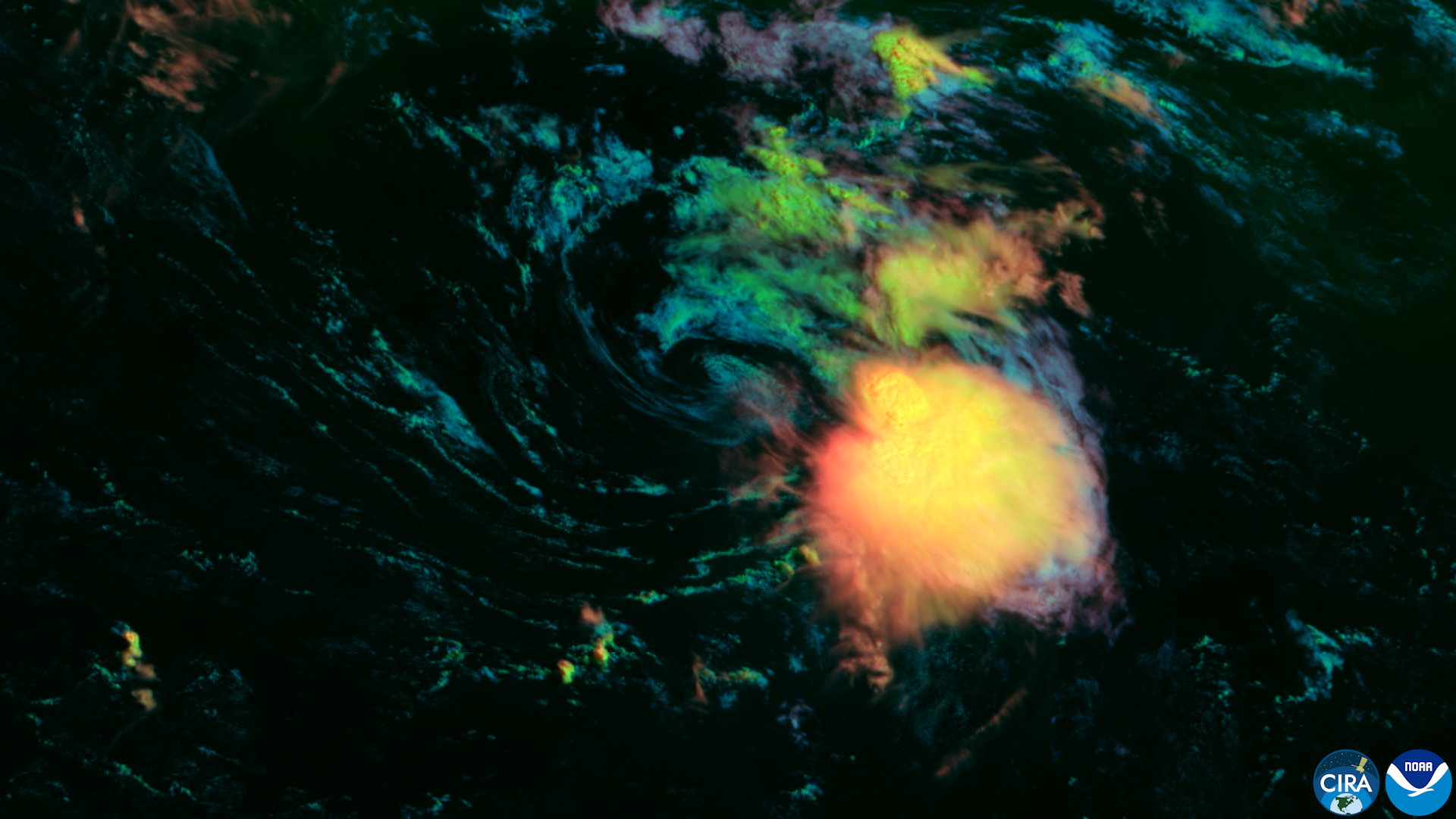Satellite view of a tropical cyclone with swirling cloud bands over dark ocean.