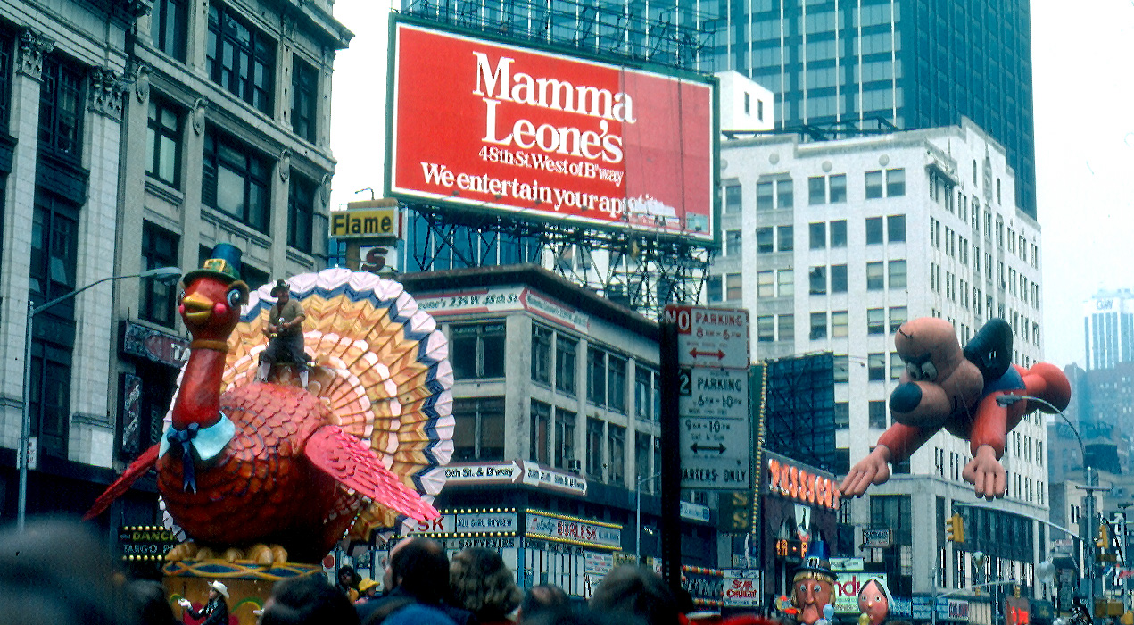 Macy's Thanksgiving Day Parade looking North from the East side of Broadway between 47th & 48th Streets, 1979.
Bob Keeshan rides the Tom Turkey float as the Underdog balloon follows.