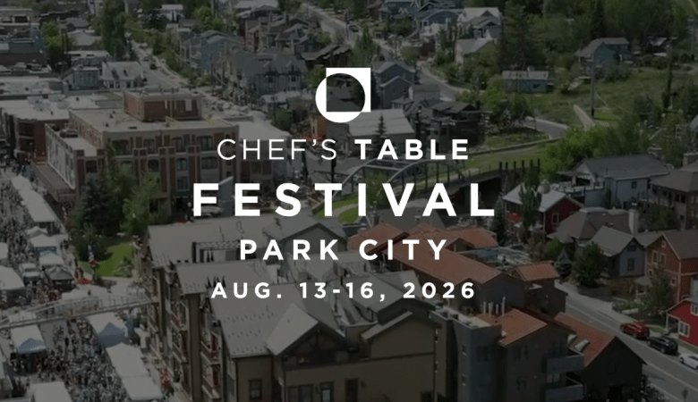 Promotional flyer for Chef's Table Festival overlaid on an aerial view of a mountain town.