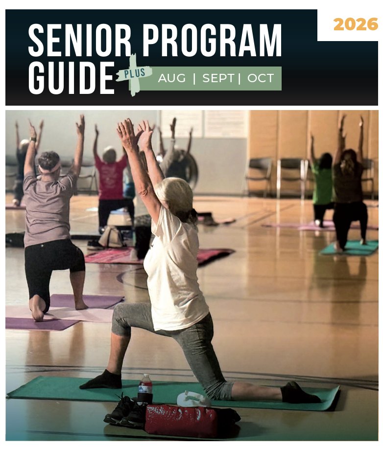 Program guide cover showing older adults on exercise mats with arms raised in a gymnasium.