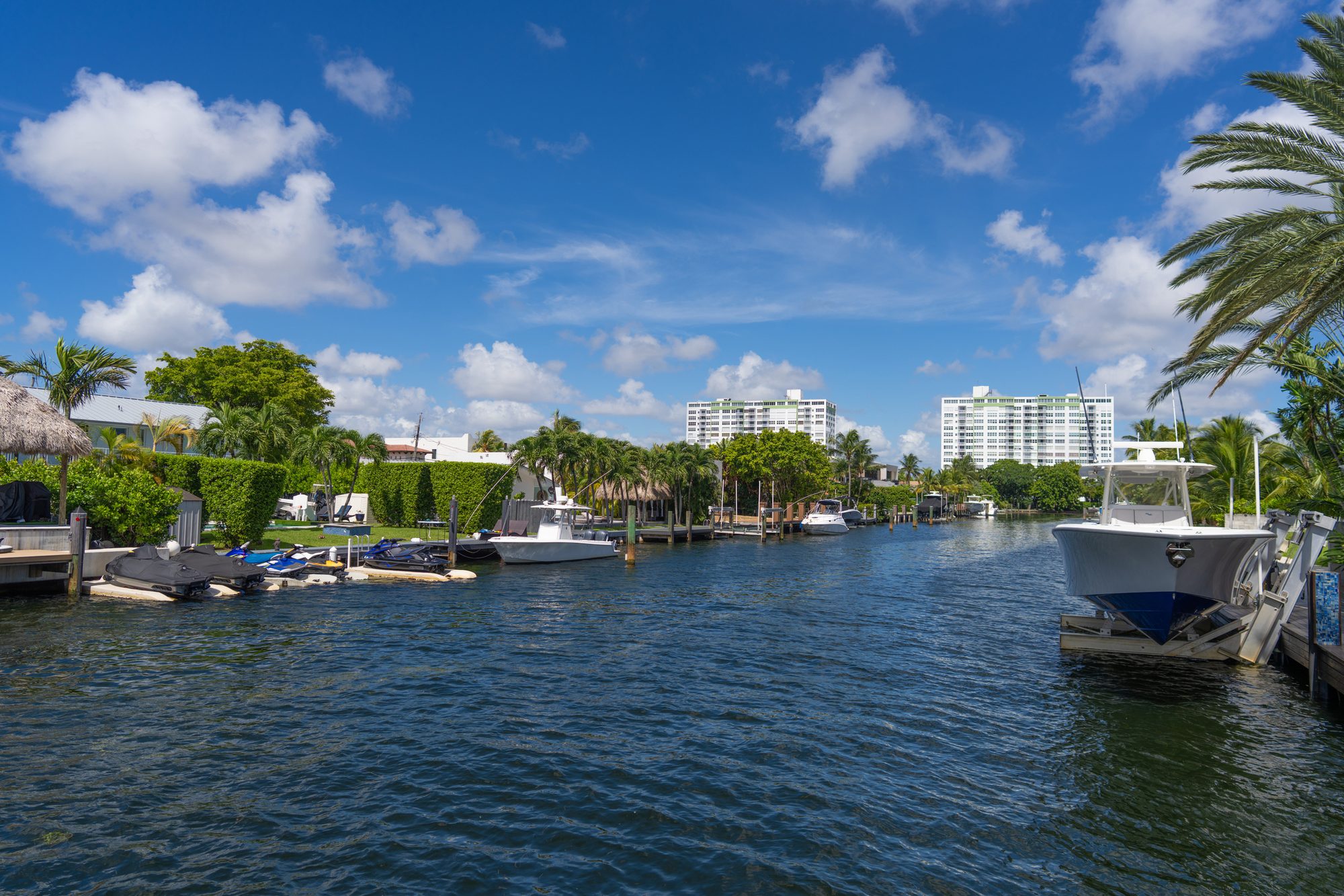 Boats moored at a canal in North Miami,  Florida