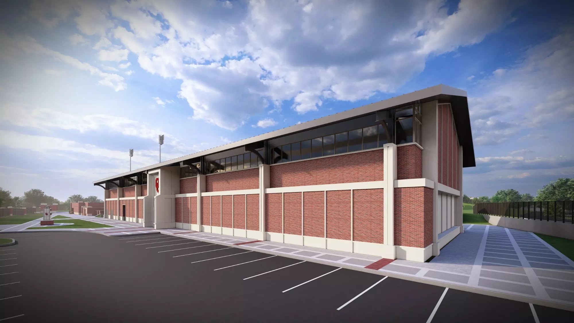 Architectural rendering of a two-story brick building with large windows and a parking lot.