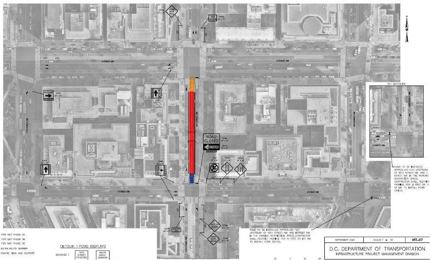 Aerial traffic detour map with colored route markings for a street closure.
