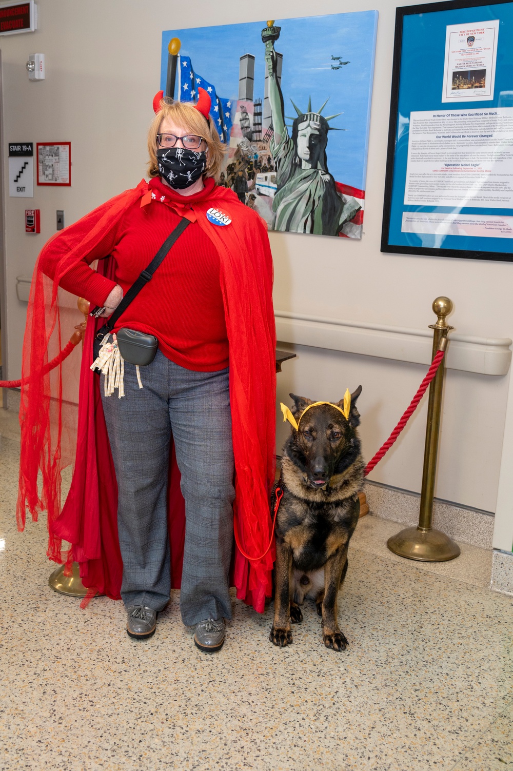 Costumed handler and dog at Walter Reed on Halloween in 2022.