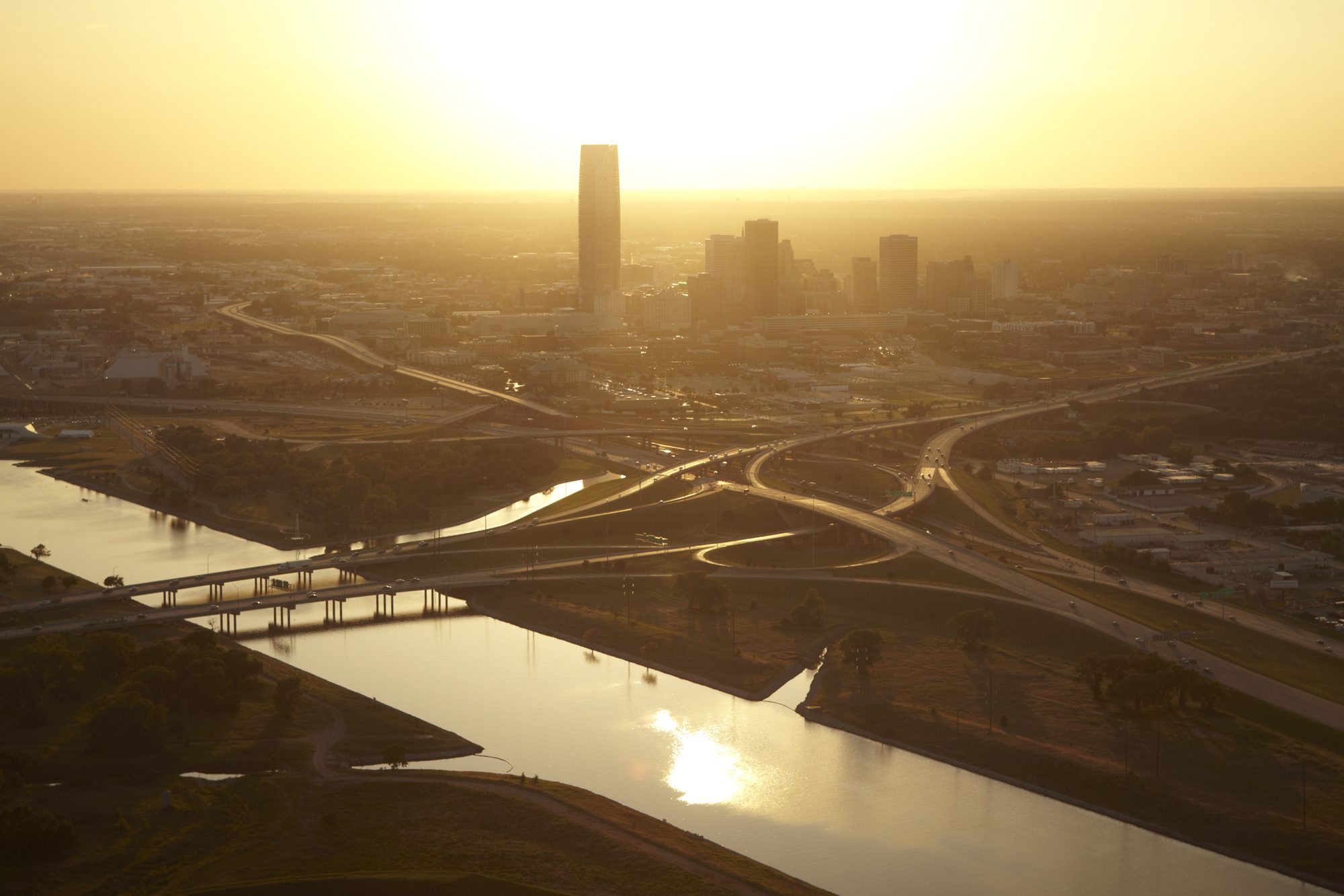 This photo of downtown Oklahoma City and the Oklahoma River at Sunset is for editorial use only. It is current as of January 2015. It comes from the Flickr folder of photo assets for Media requests to the Greater Oklahoma City Chamber or the Oklahoma City. https://www.flickr.com/photos/oklahomacity/8347784256/