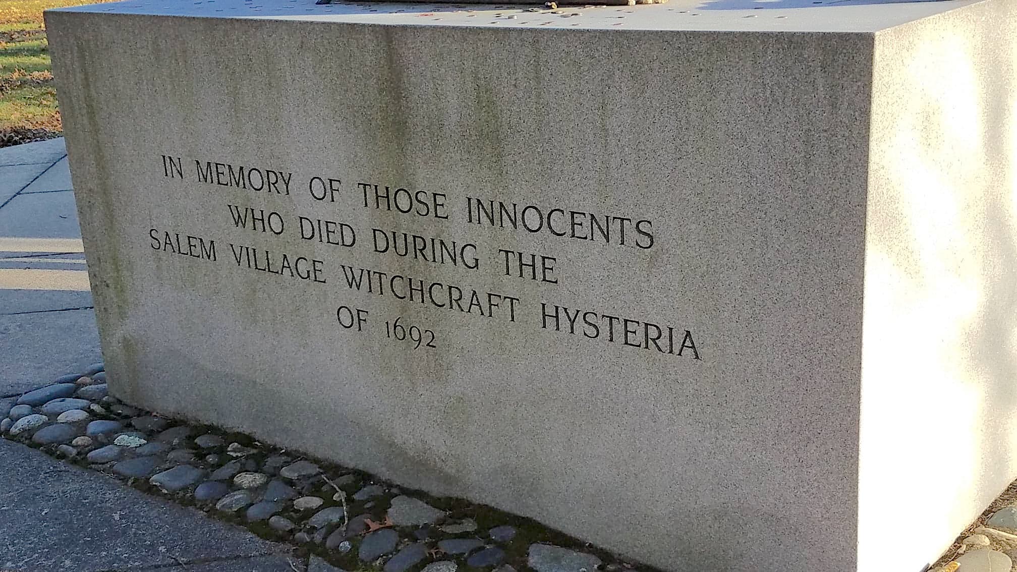 Stone memorial inscription honoring victims of the 1692 Salem Village witchcraft hysteria.