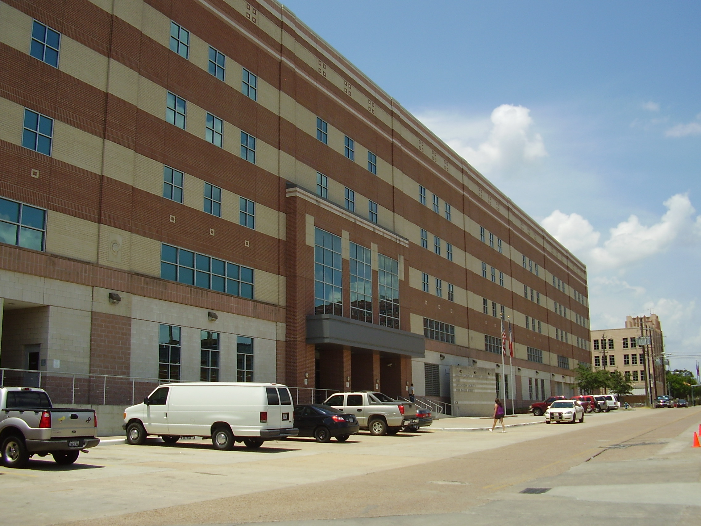 Multi-story brick building serving as a county sheriff's office headquarters.