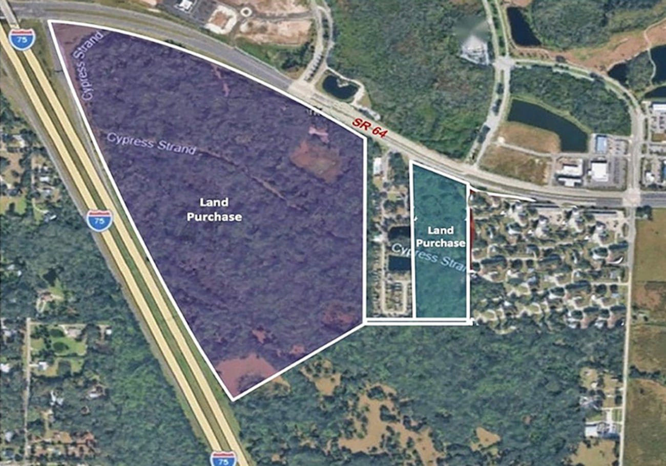 Aerial satellite map showing two highlighted land parcels near SR 64 and I-75.