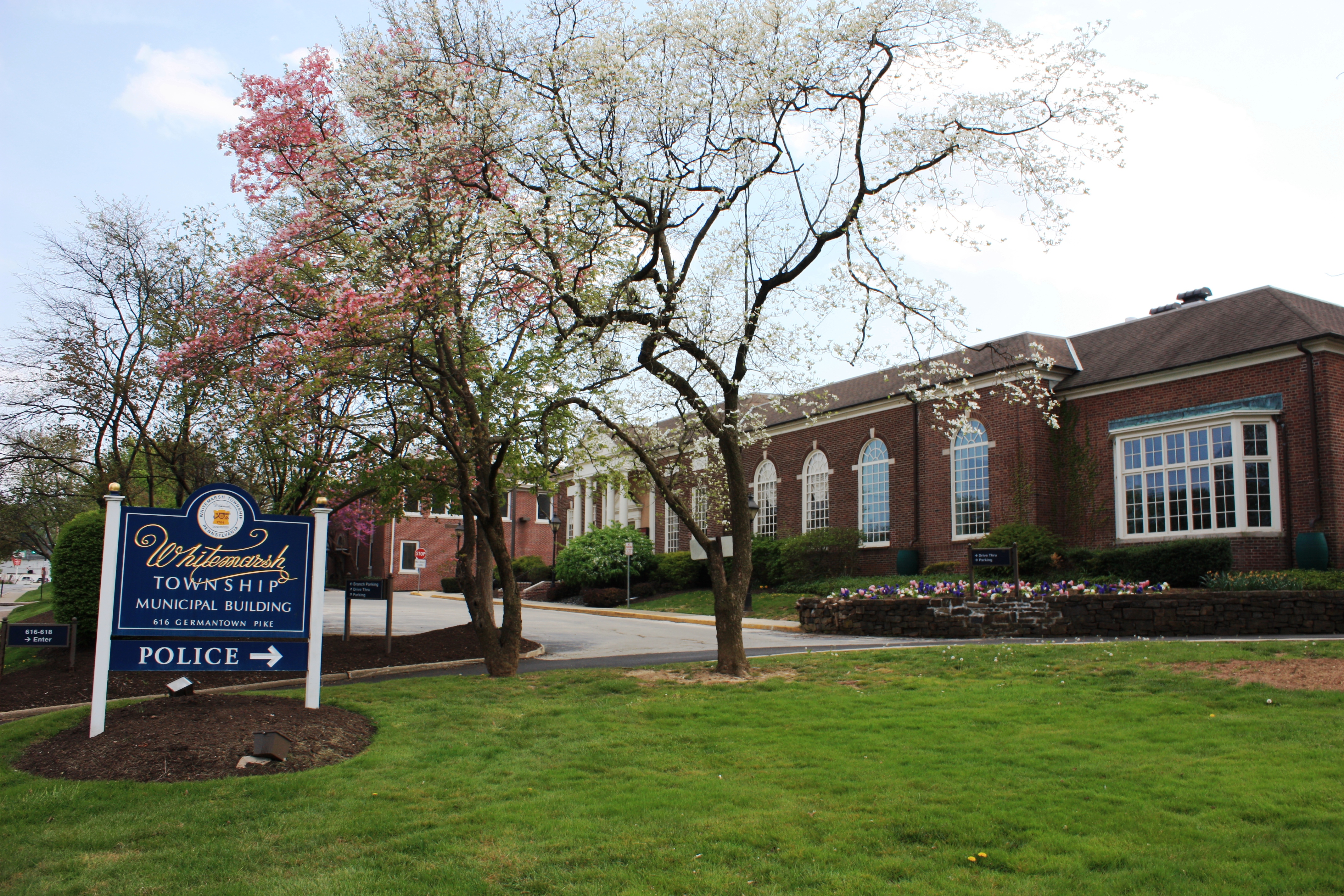 Exterior of a municipal government building on a clear day.