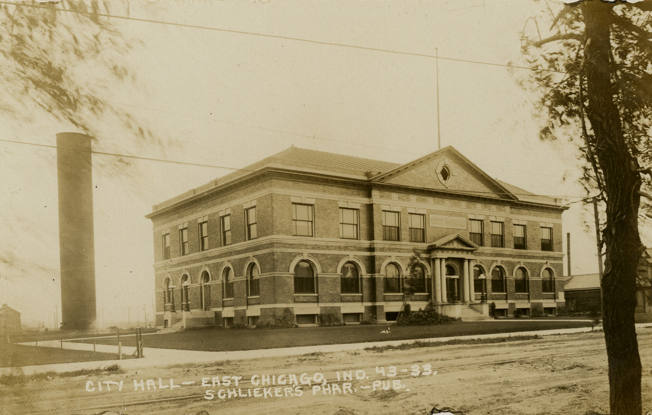 Historic two-story brick building labeled as East Chicago City Hall, circa 1910.