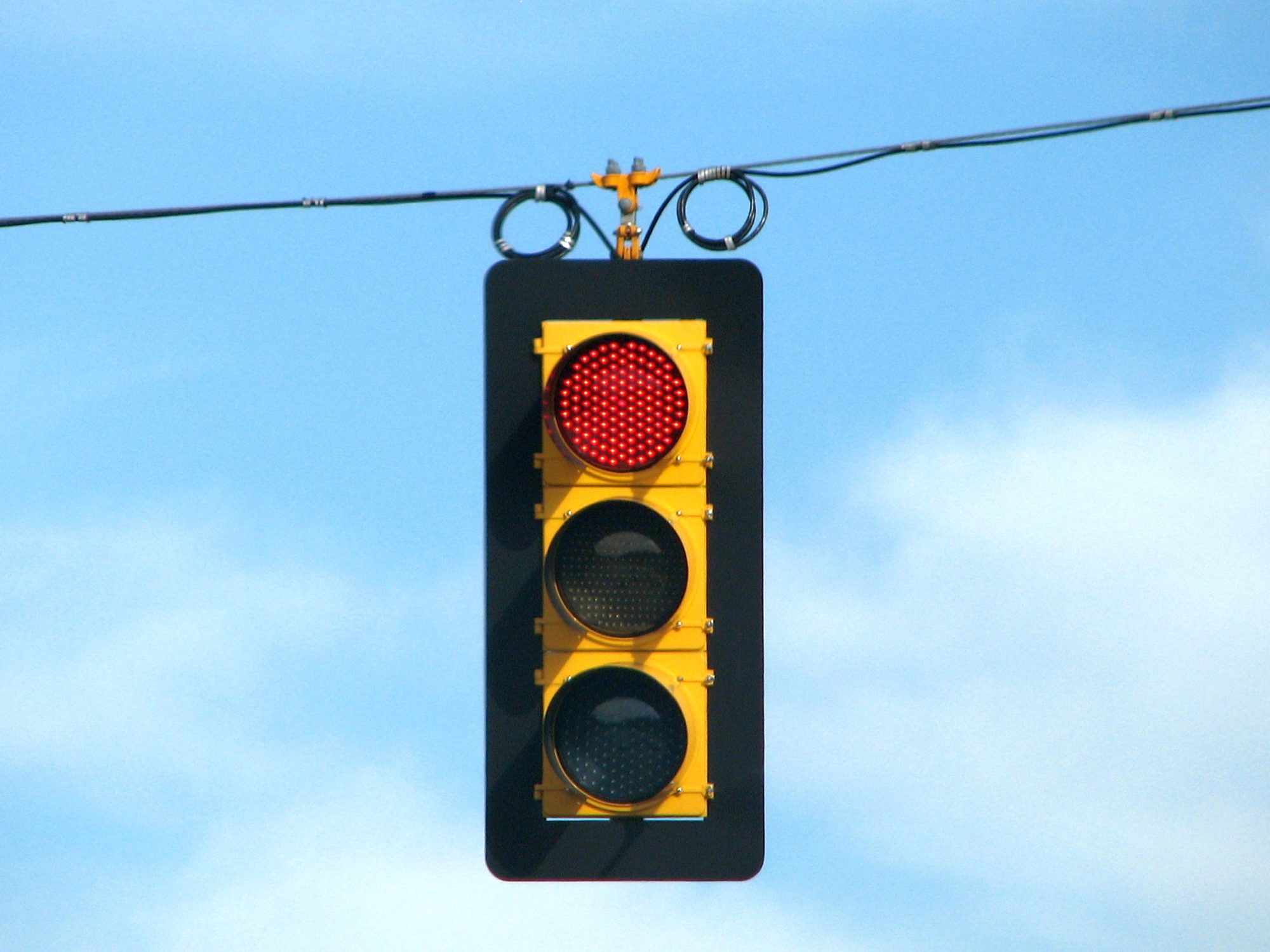A close up view of a traffic light illuminating red for stop using light-emitting diodes (LED) in North Carolina, United States.
