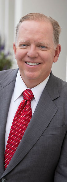 Herb W. Morgan for California State Controller Headshot Outside Leaning On Wall