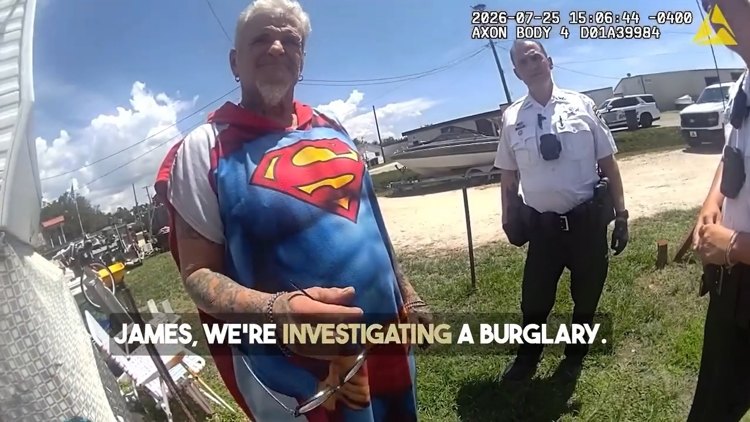 Body-camera footage shows a man in a Superman costume standing outdoors with deputies nearby.