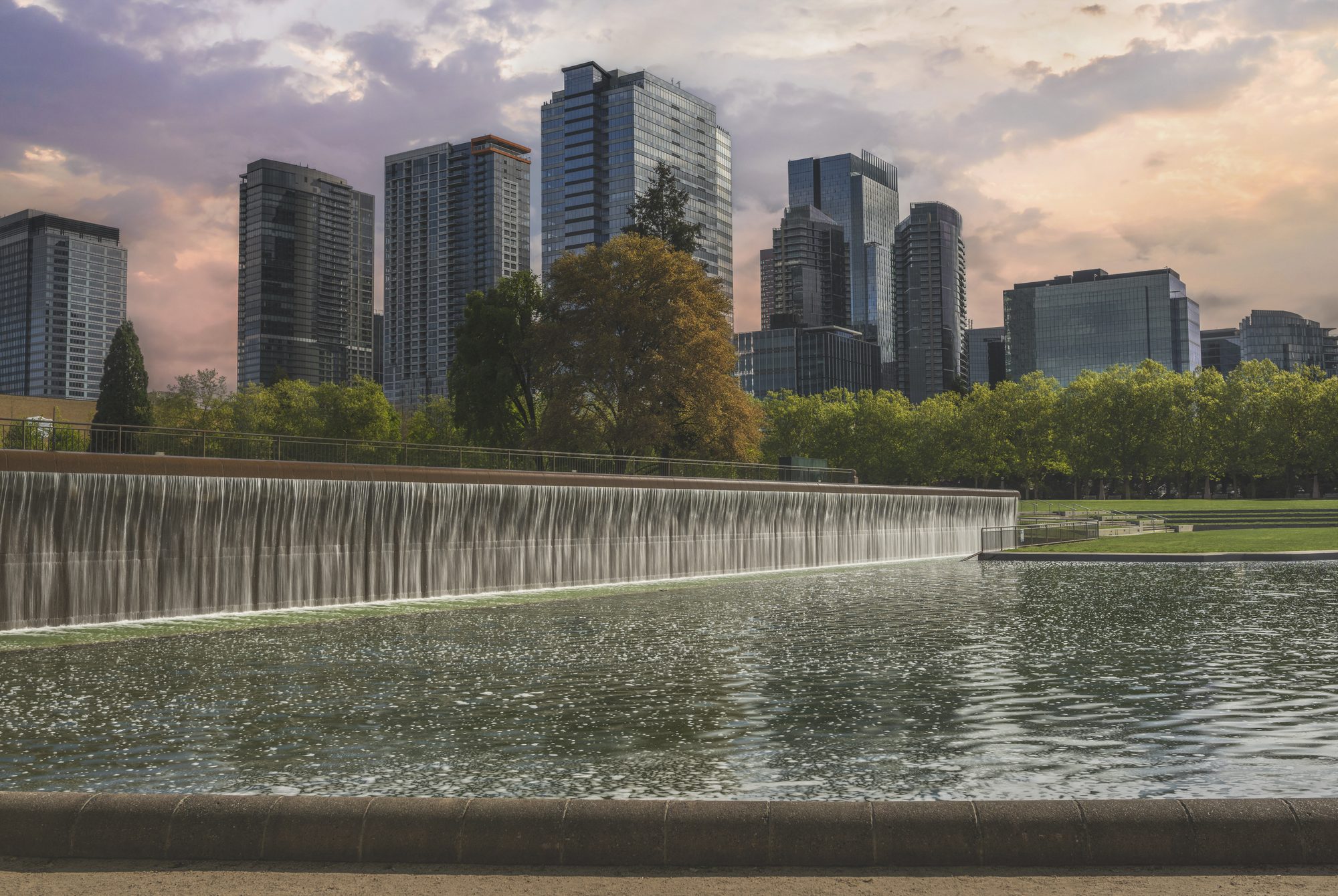 Scenic view of river by buildings against sky,Bellevue,Washington,United States,USA