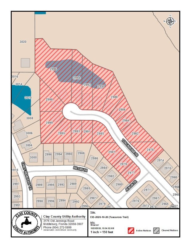 Parcel map showing red-hatched residential lots along a residential street under a water advisory.