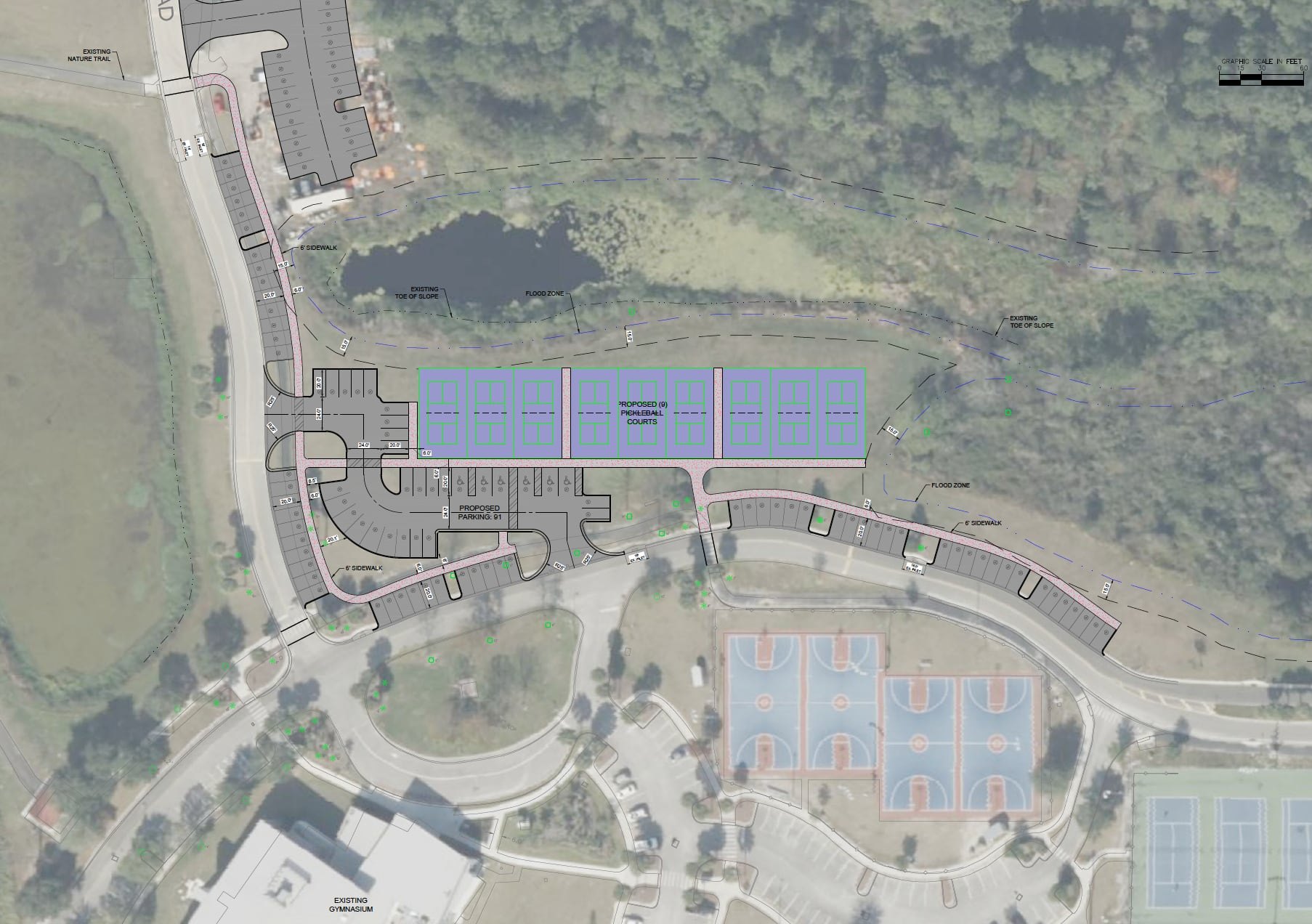 Aerial site plan of a park with a rectangular court complex highlighted in blue.