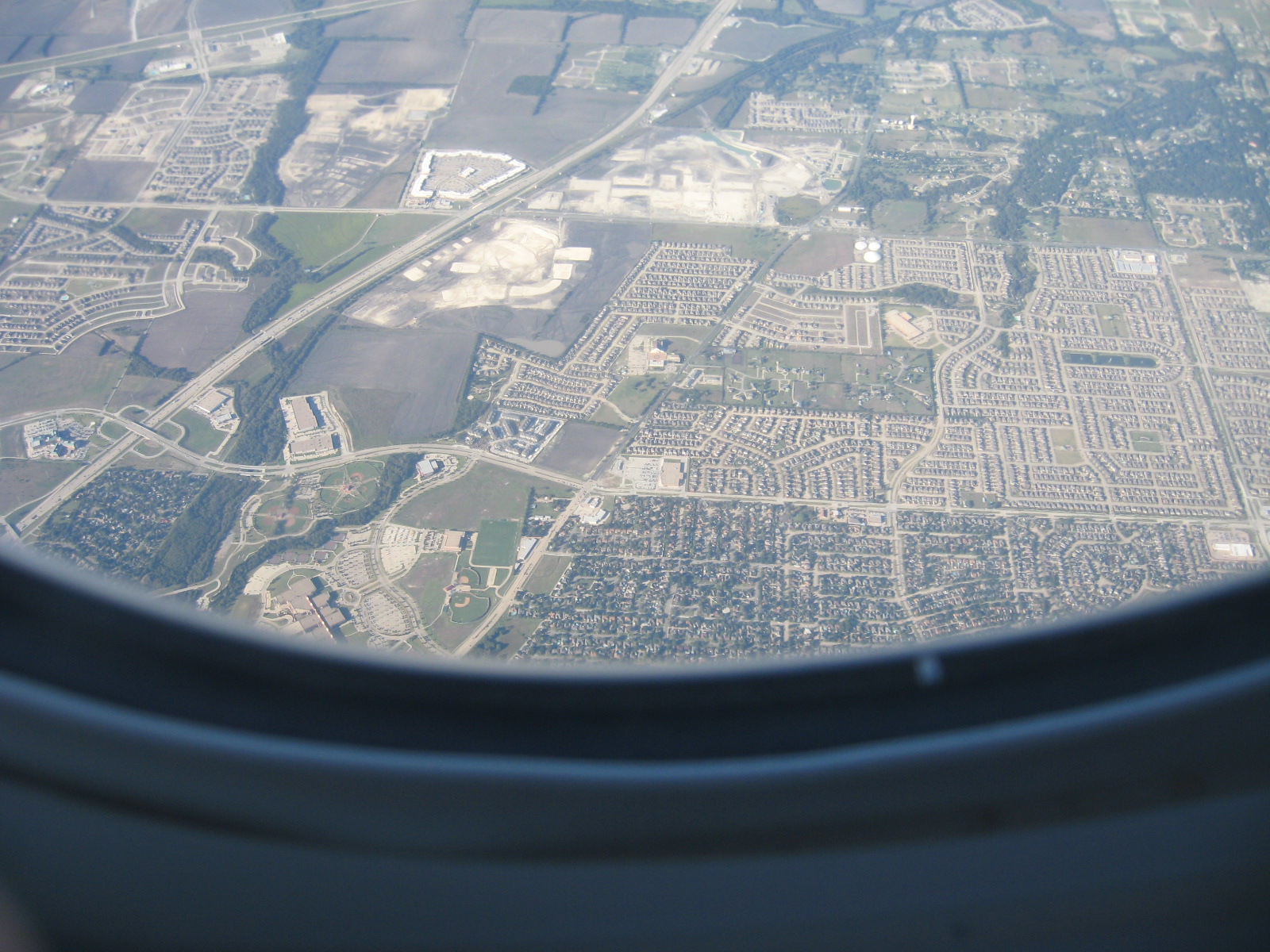 Aerial view of Allen, Texas suburban streets, subdivisions, and commercial development.