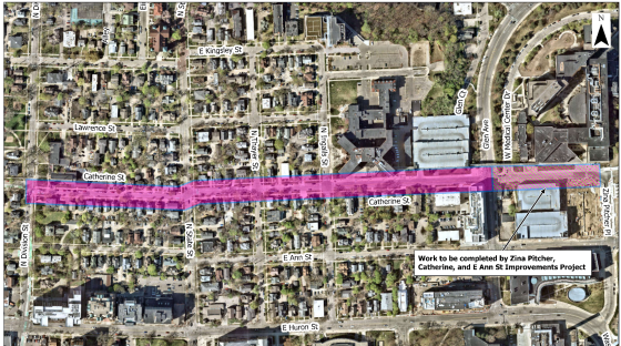 Aerial street map with a pink highlighted corridor showing a bike route through Ann Arbor.