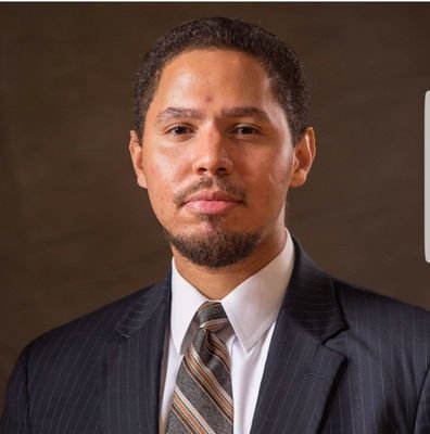 A headshot of Justice Noah P. Hood.
