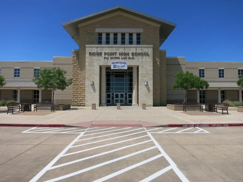 Photo shows Ridge Point High School in Fort Bend ISD at 500 Waters Lake Blvd., Sienna (Missouri City address), TX 77459. View is toward the southwest.
