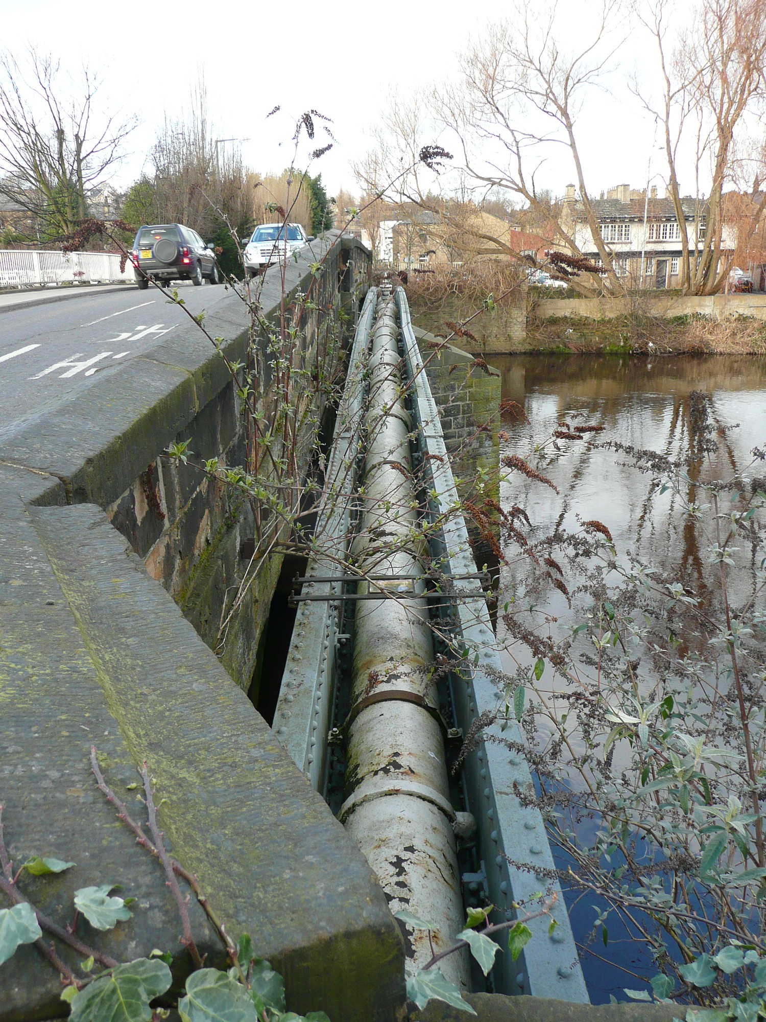 Water main alongside Rastrick Bridge