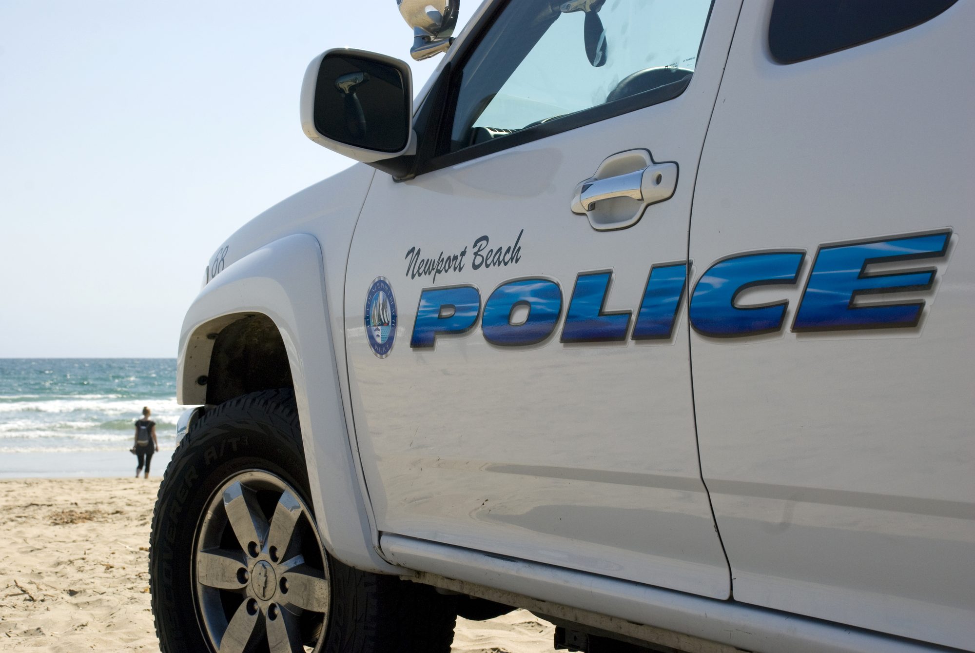 Newport Beach Police patrouling on beach, California