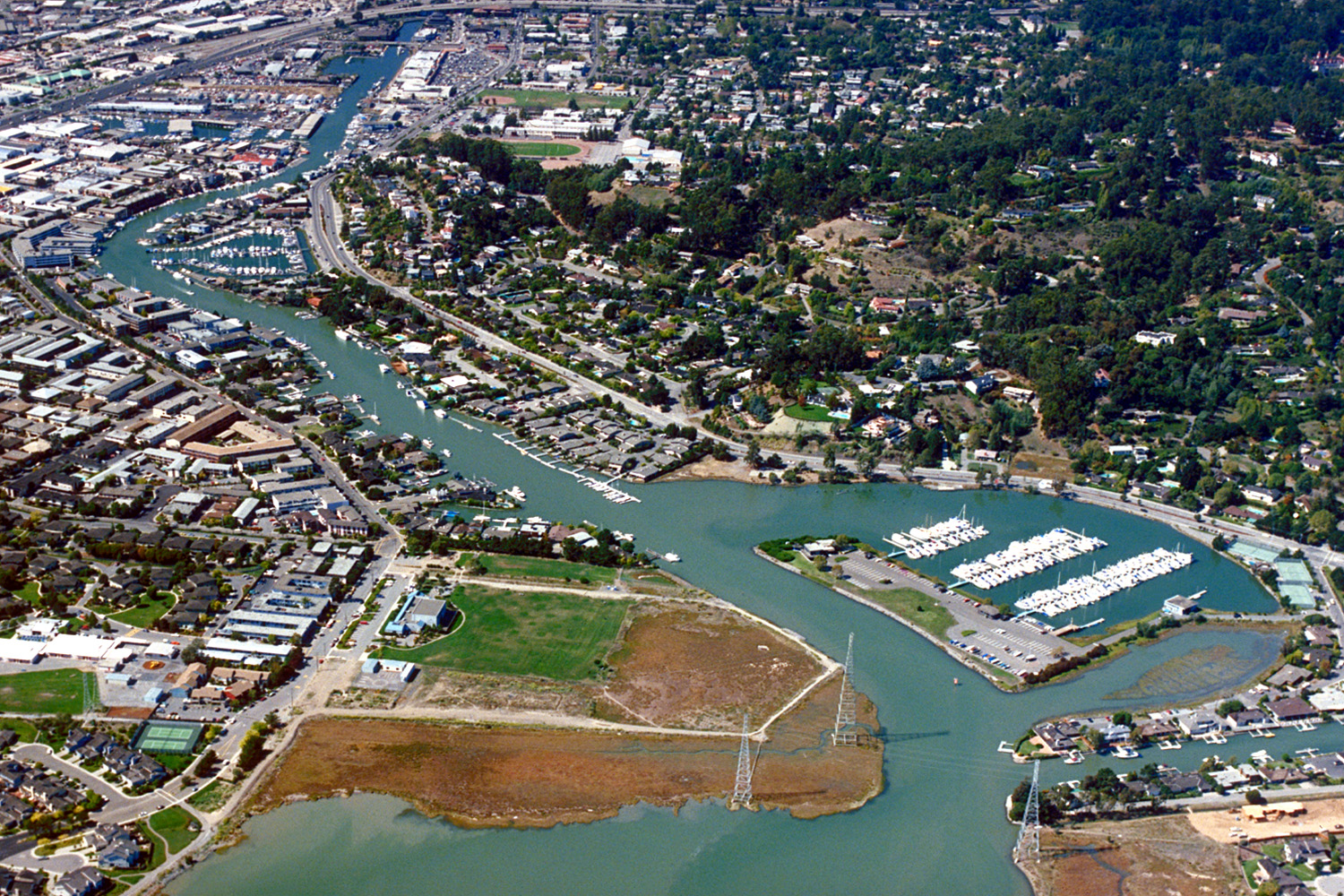 Aerial view of the Canal neighborhood in San Rafael along the bay shoreline.