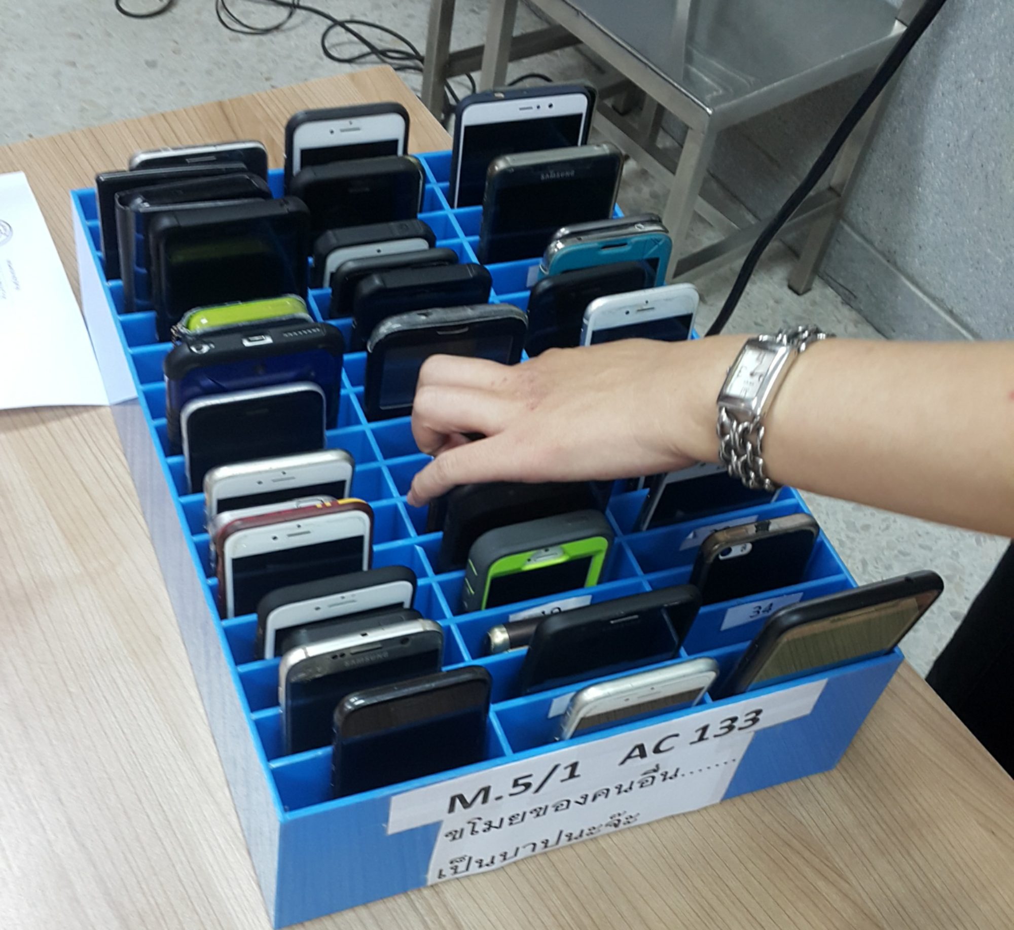 A mobile phone cage used for keeping the students' phones away from them to stop their uses of mobile phones in the high school