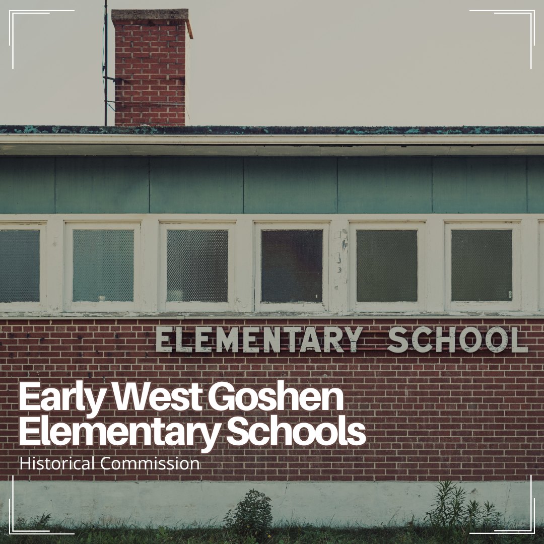 Brick elementary school building with white-framed windows and a chimney.