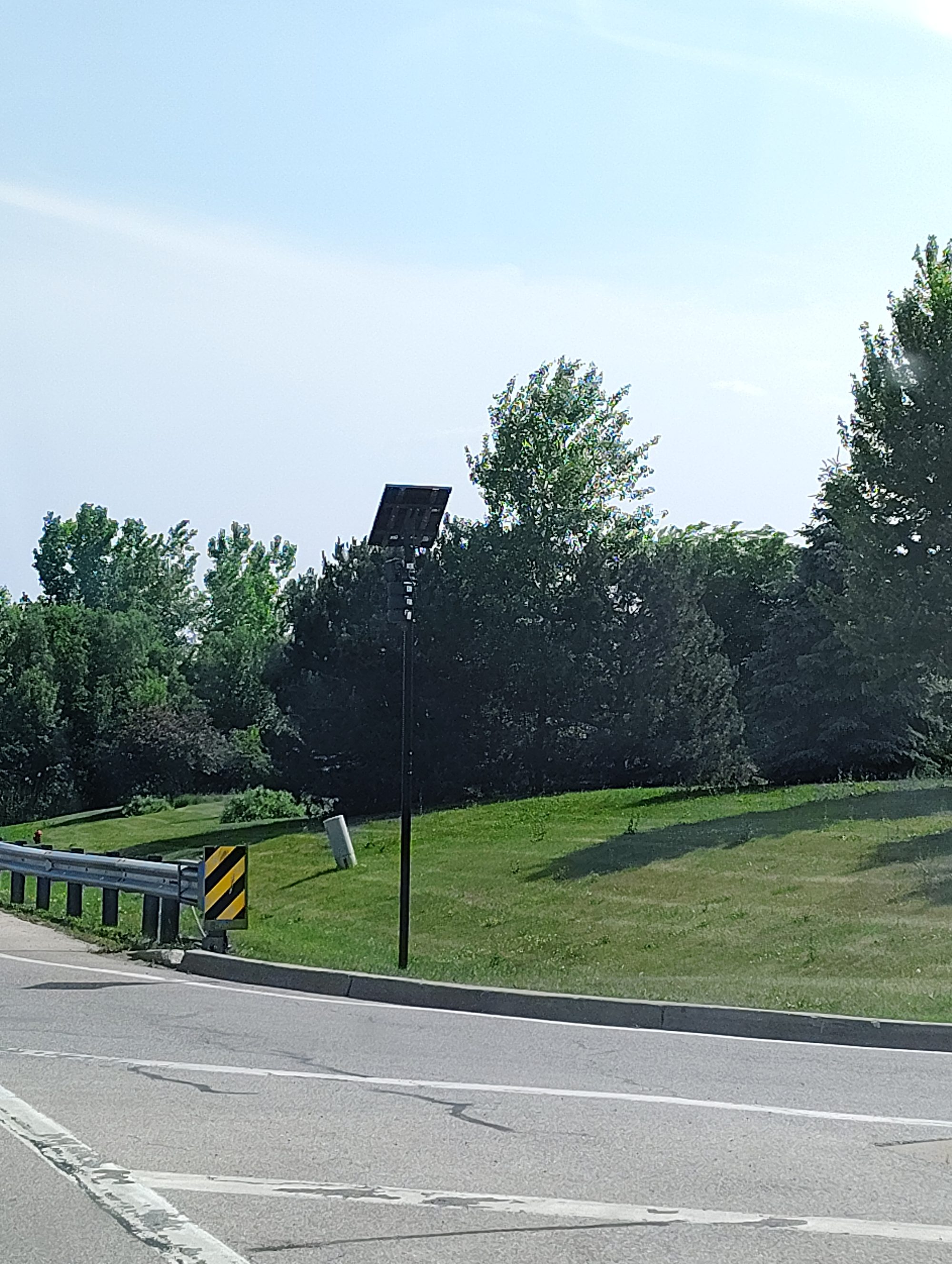Flock Safety brand ALPR camera facing southbound traffic along Orchard Rd., Aurora, IL