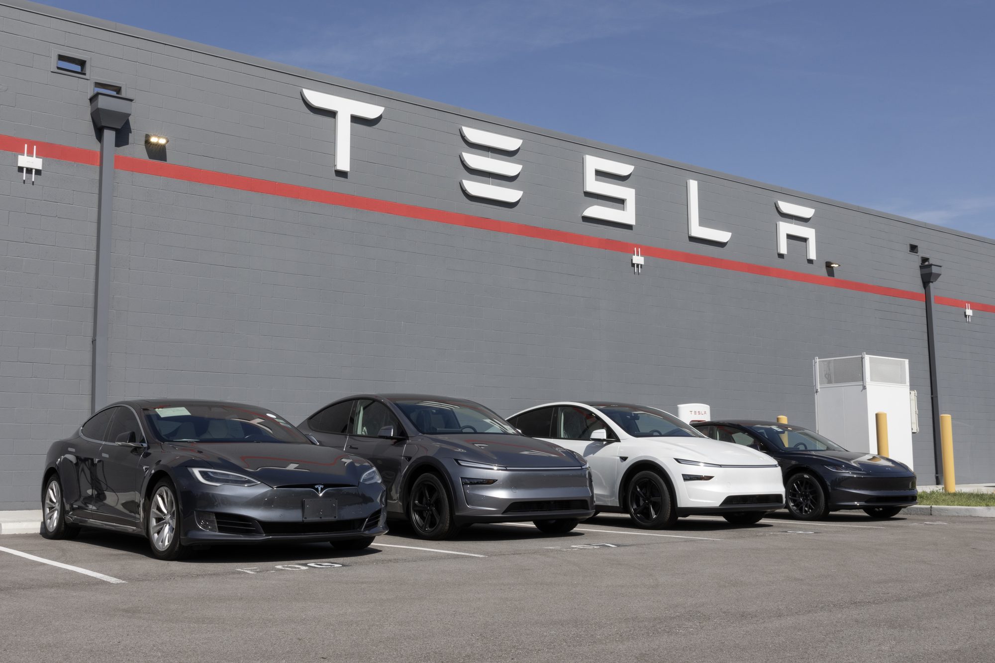 Tesla EV electric vehicle Service Center. Tesla models include the Cybertruck, Model 3, Model Y, Model X and Model S