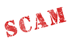 The word SCAM in large red distressed stamp-style capital letters on a white background.