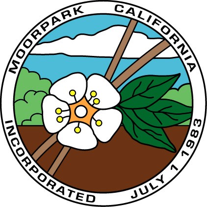 Circular city seal featuring a white flower, green leaves, and the words Moorpark California Incorporated July 1 1983.