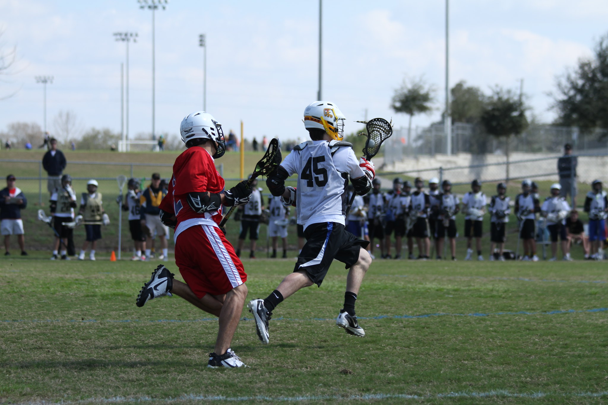 Lacrosse players compete at Wesley Chapel District Park in a February 2012 file photo.