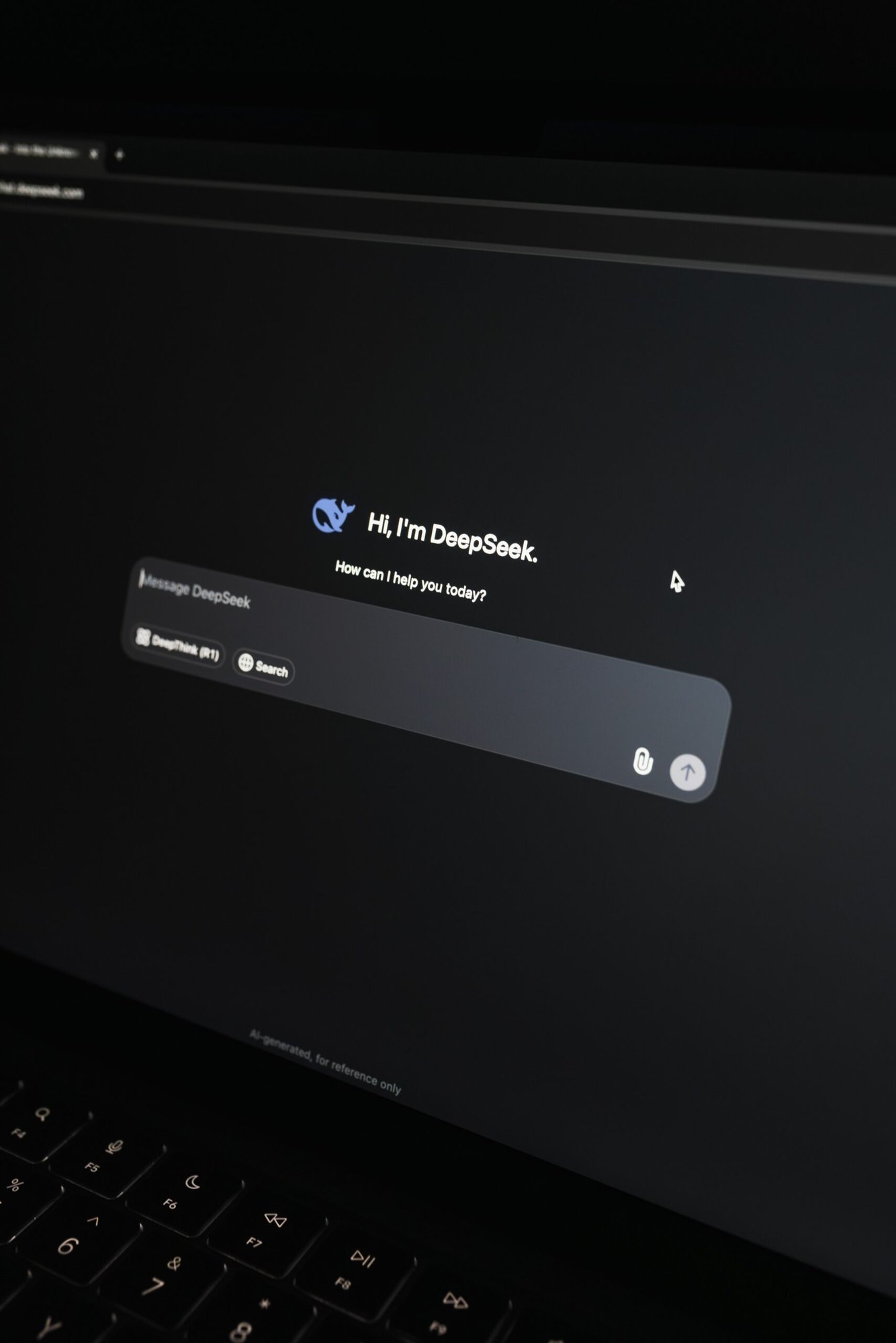 Laptop screen showing an AI chatbot interface in dark mode.