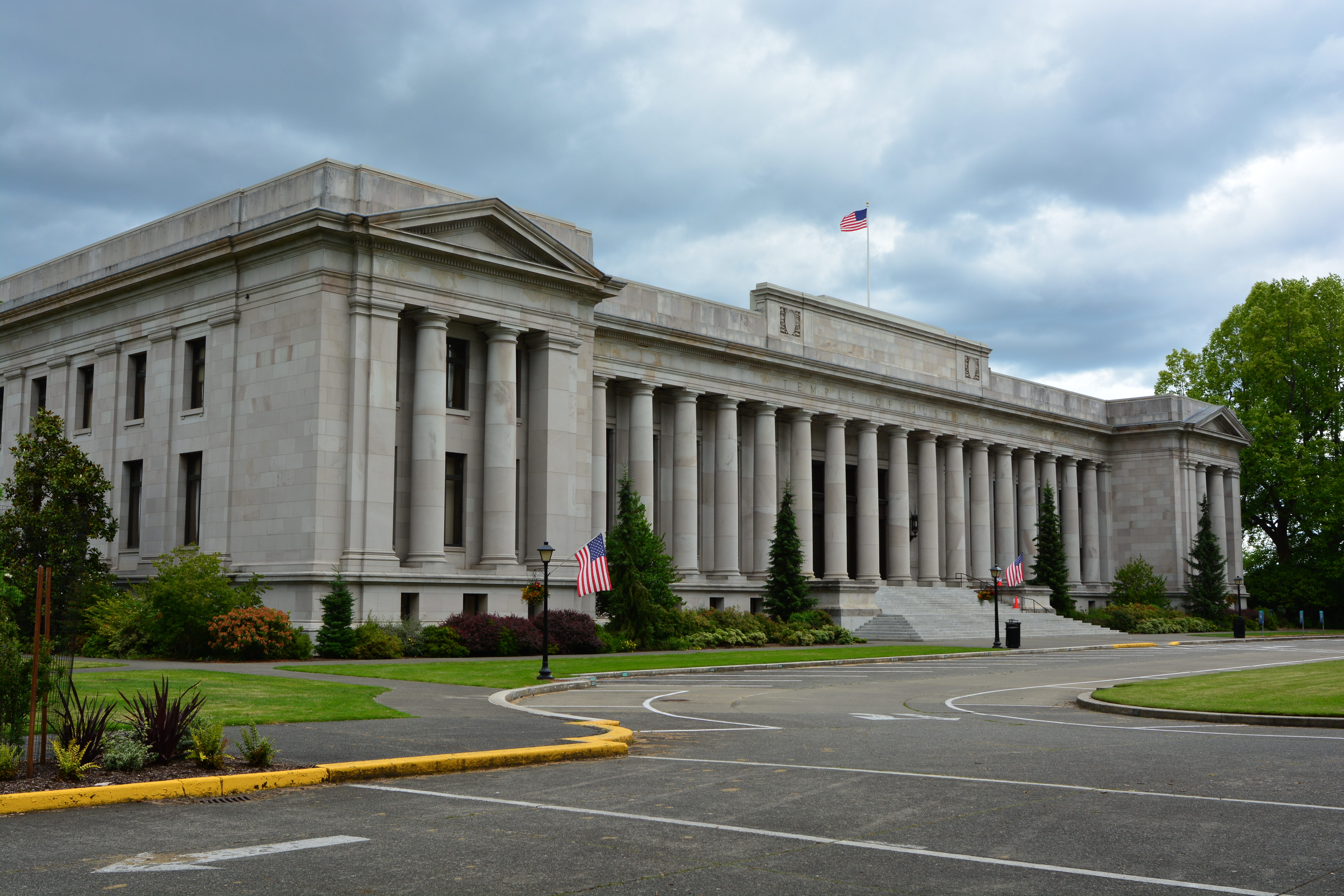 Stone neoclassical exterior of the Temple of Justice on the Washington State Capitol Campus.