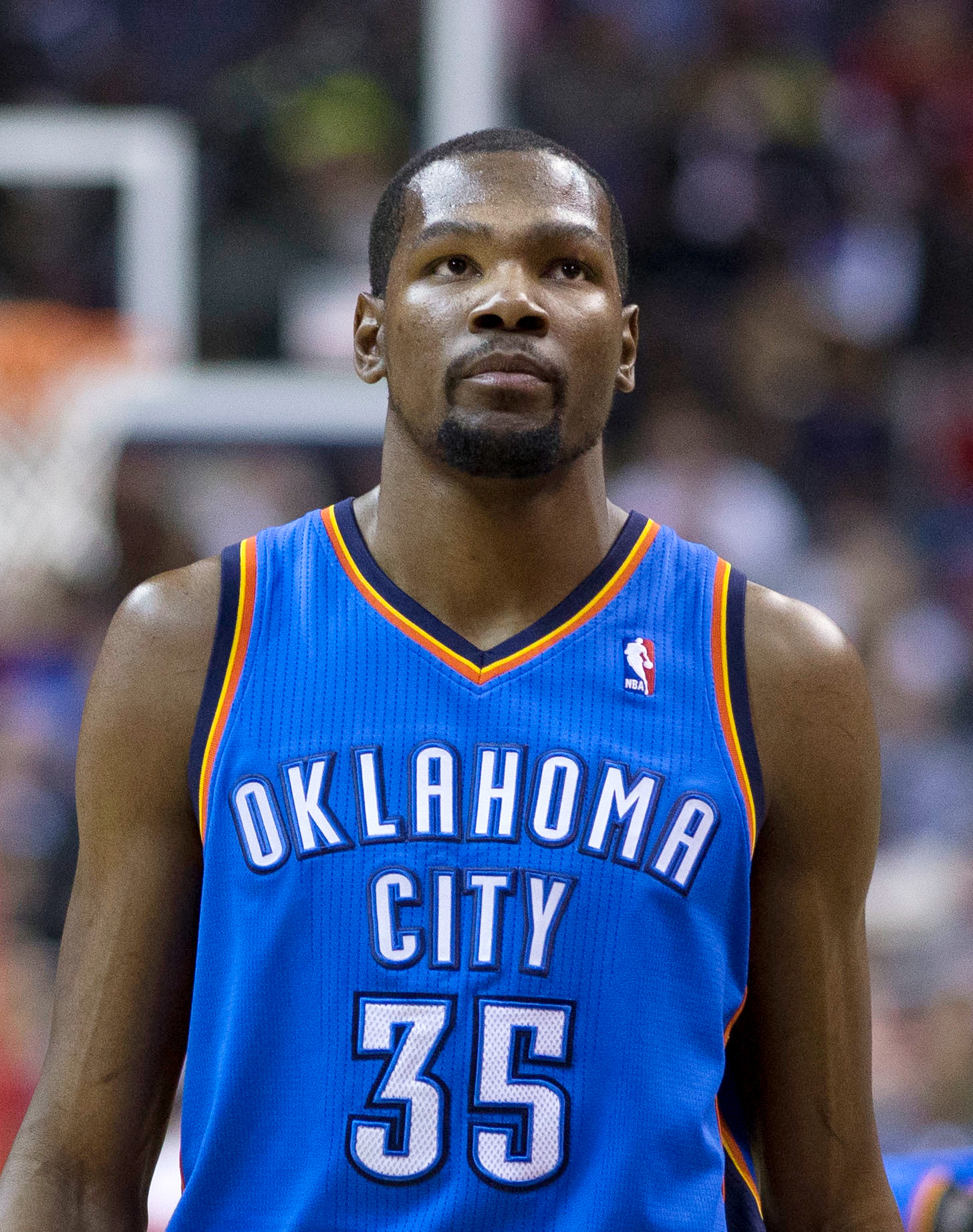 Basketball player wearing blue Oklahoma City Thunder jersey number 35 on the court.
