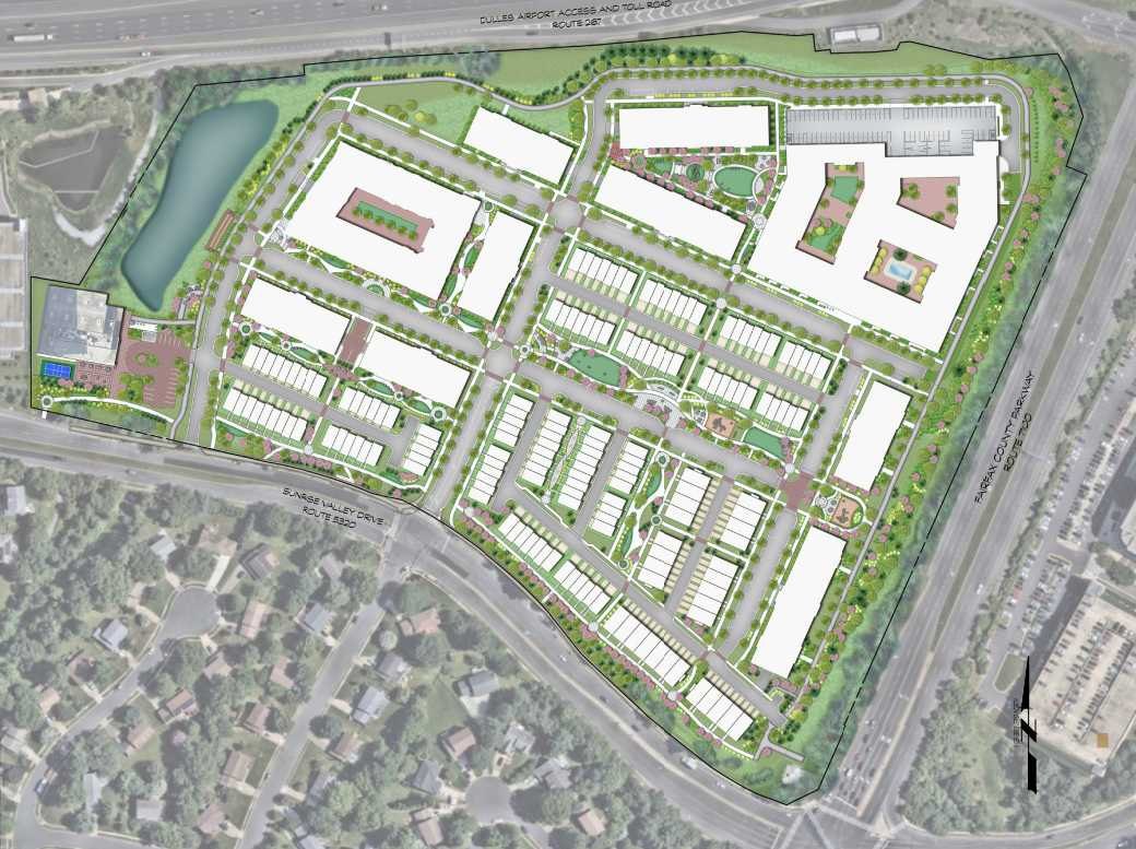 Color-coded architectural site plan showing building footprints, roads, and green spaces for a large residential development.