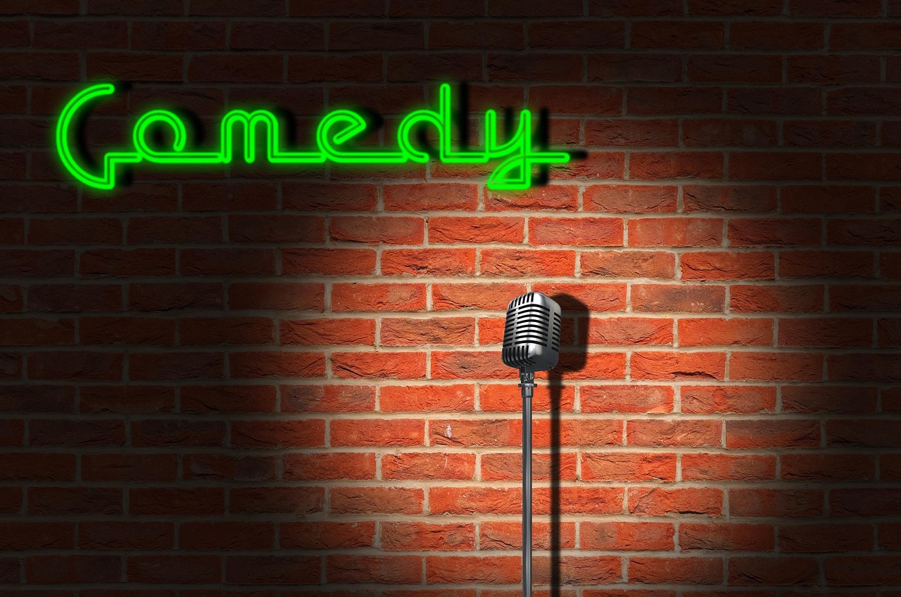 Comedy, club, humor, bar, stage, microphone, neon lights, stand up comedy, comedy bar, fun, performance, theatre, entert