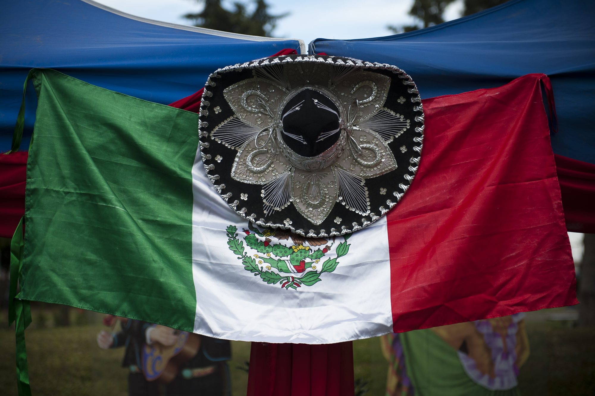 A Mexican flag is displayed during the Hispanic Heritage Month finale festival Oct. 22, 2011, at Arkadas Park, Incirlik Air Base, Turkey. The base commemorated Hispanic Heritage Month with several events that culminated in a festival featuring food, music and dancing.