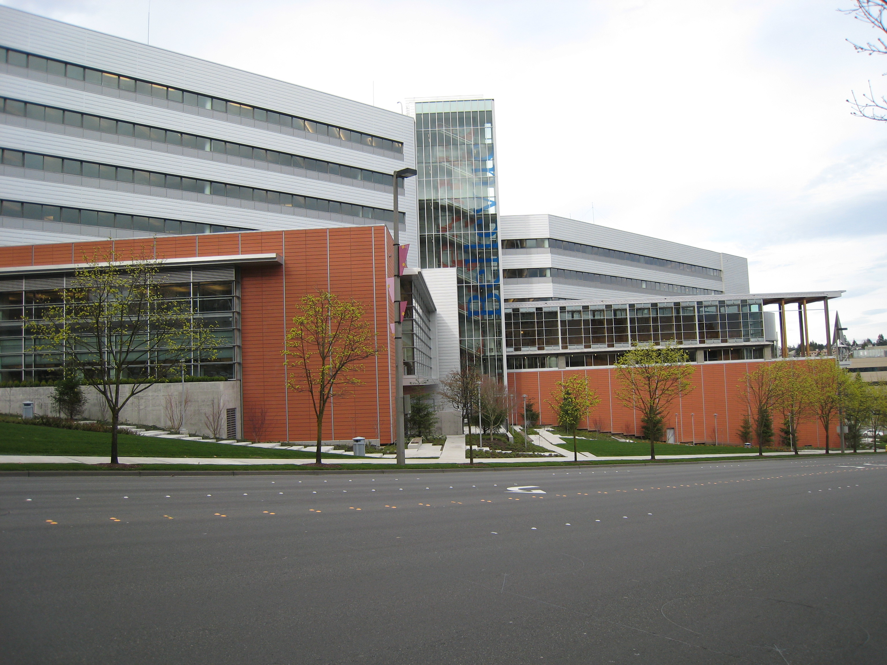 Exterior of Bellevue City Hall, a modern multi-story building with red-orange and gray panels.