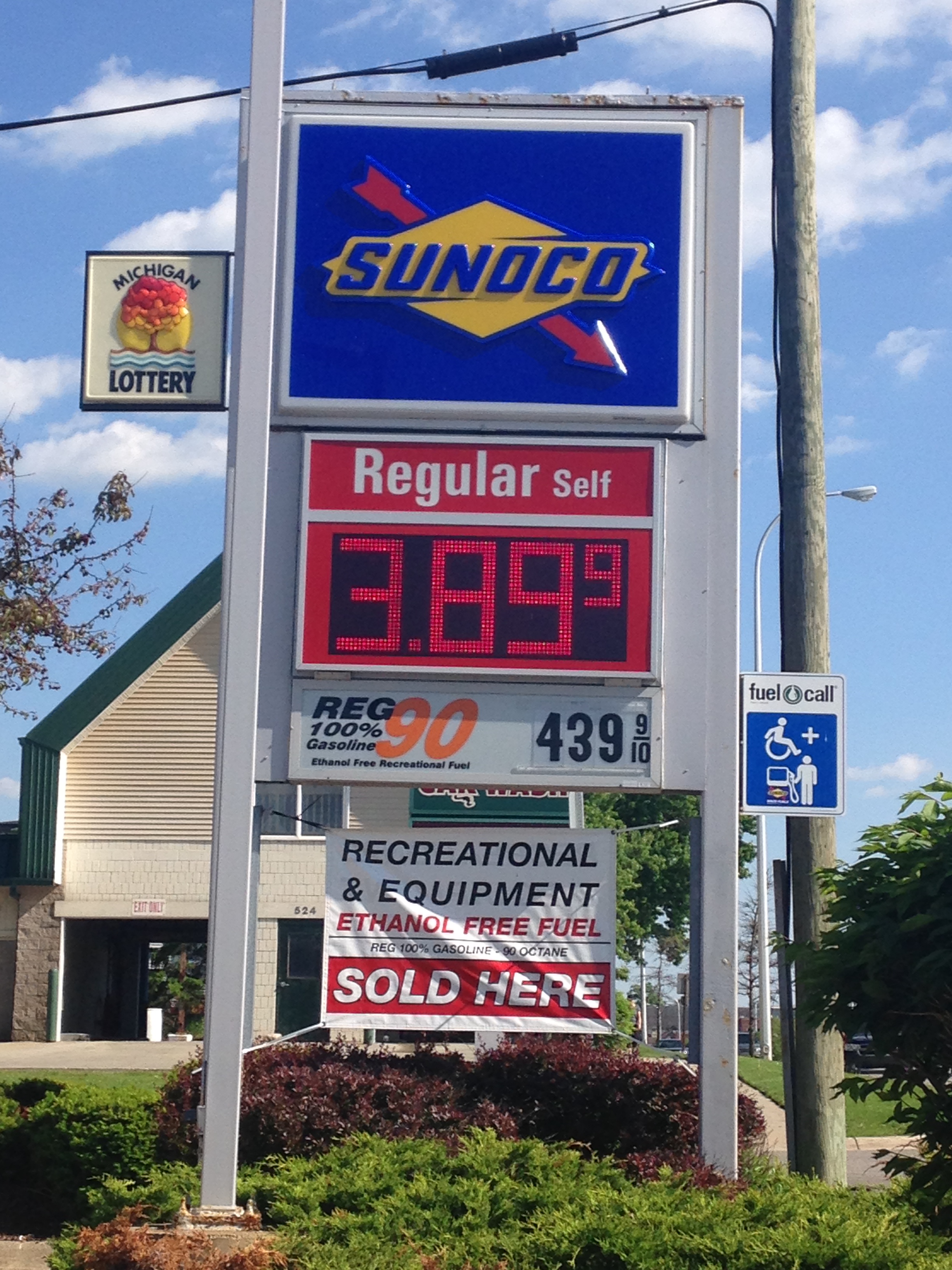 Gas station price sign showing fuel at $4.39 per gallon.