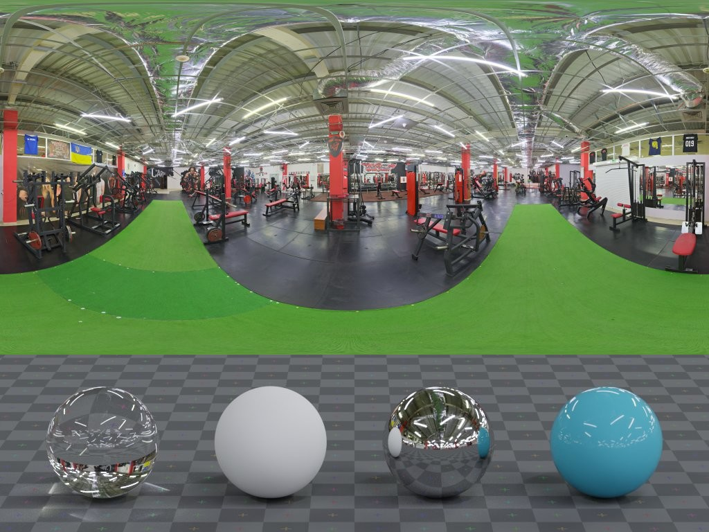 Panoramic view of a large gym interior with weight machines and cardio equipment.