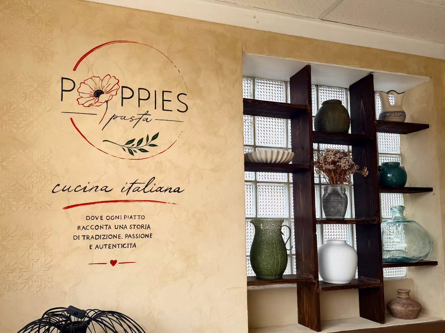 Poppies Pasta restaurant with a floral logo.