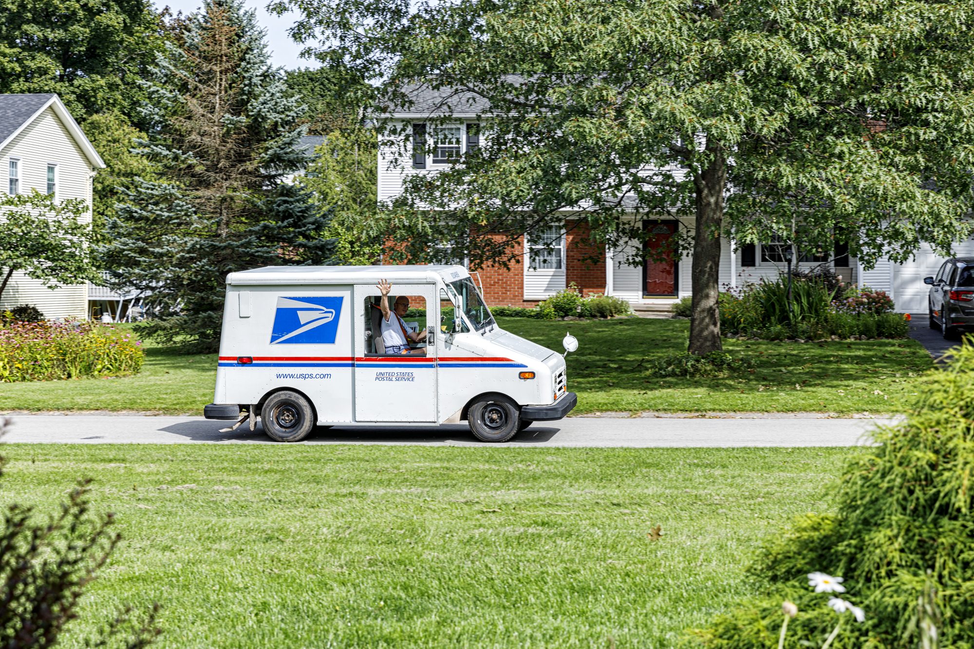 USPS Mailman Postal Van Driver Waving Out Window
