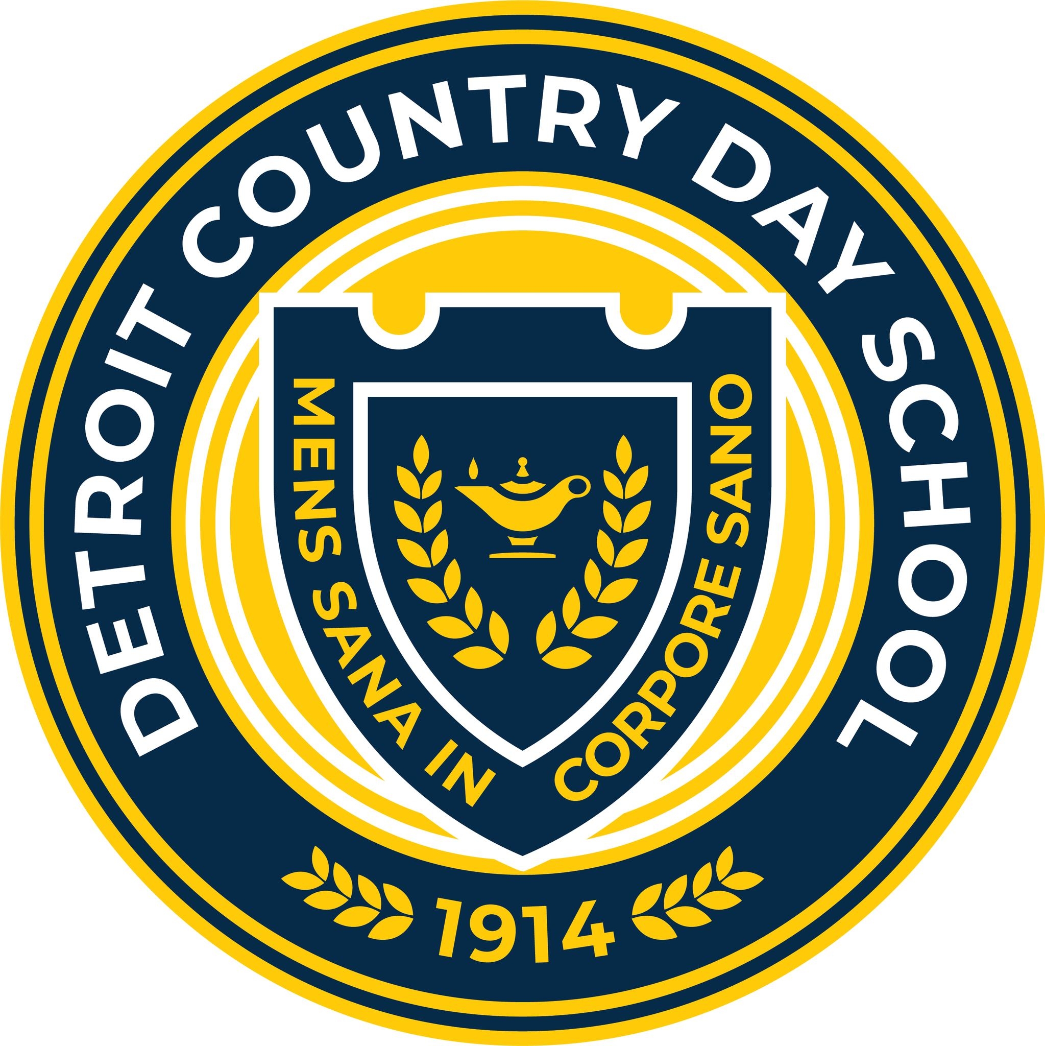 Circular navy blue and gold school seal with a shield, lamp, and Latin motto.
