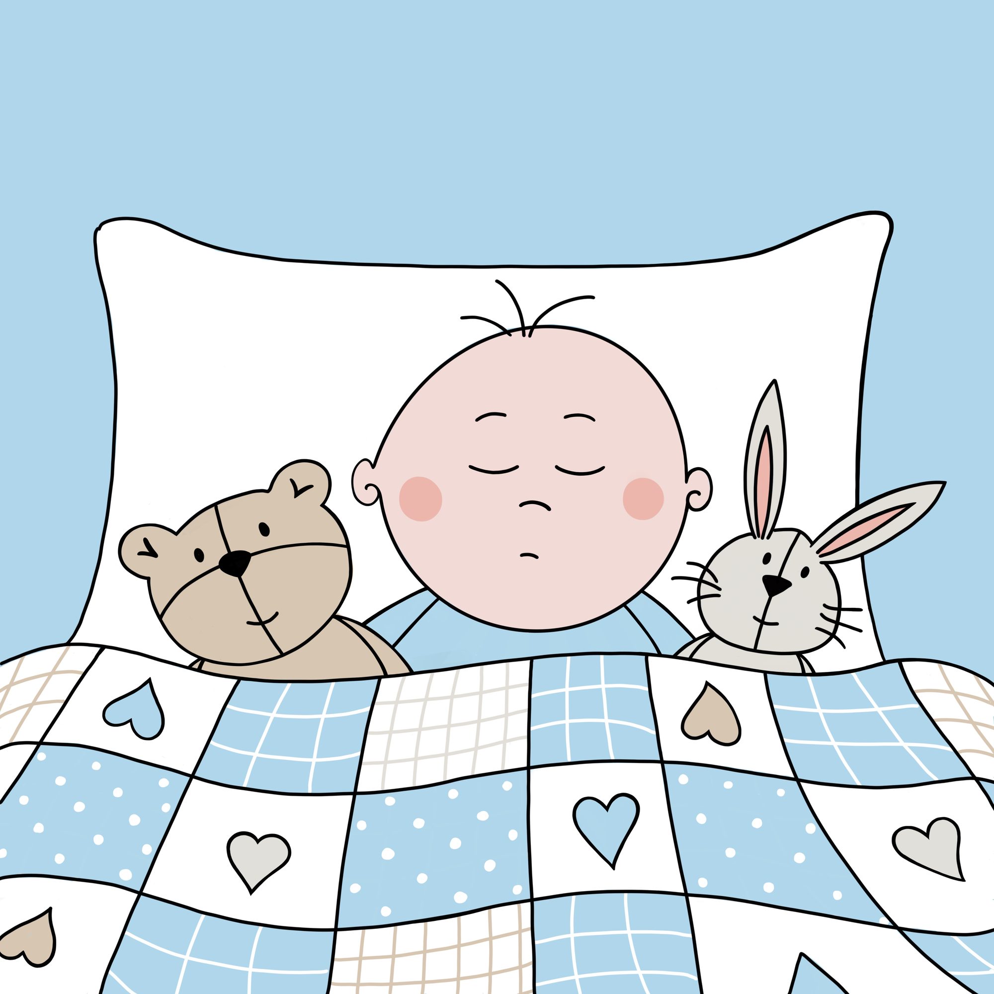 Baby boy in bed