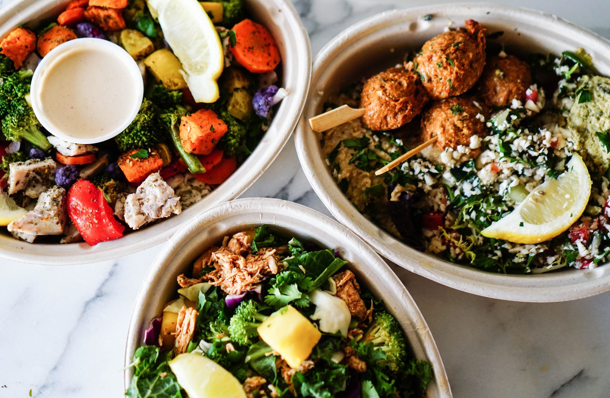 Healthy Mediterranean lunchtime dishes with vibrant vegetables and protein.