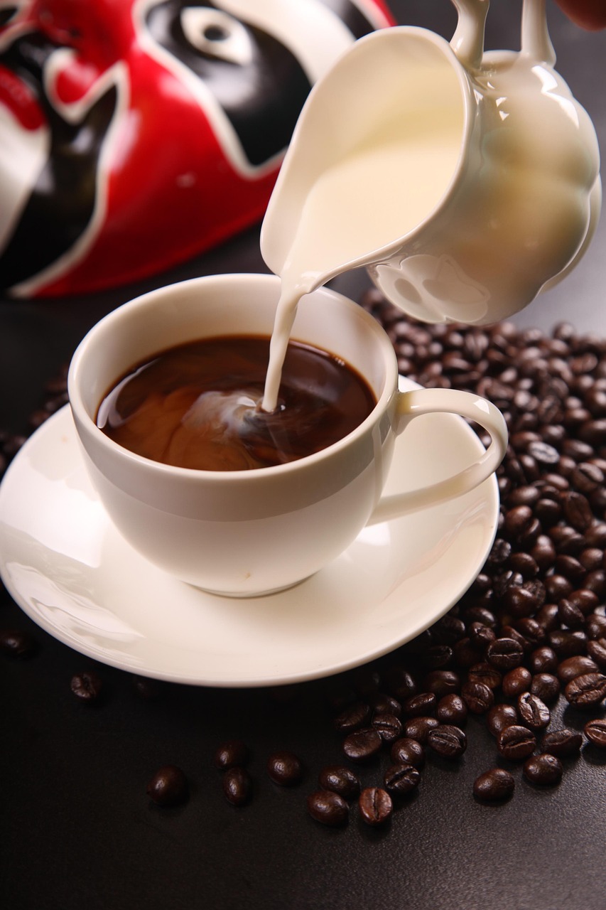 Coffee, milk, coffee beans, cup of coffee, coffee cup, cup, pouring, cream, caffeine, cafe, pour, latte, drink, beverage